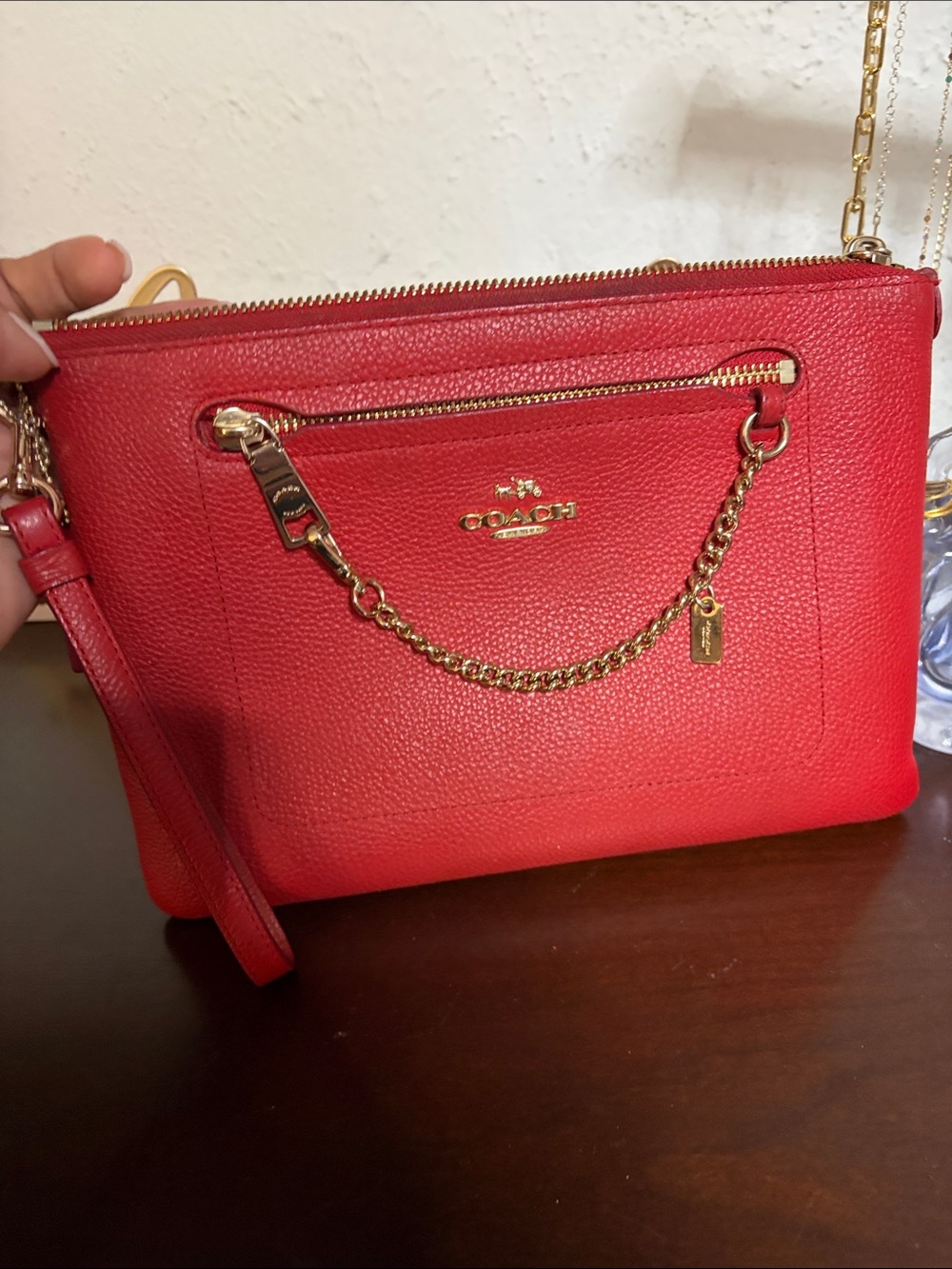 COACH Red Pebbled Leather Wristlet with Gold Chain Accent